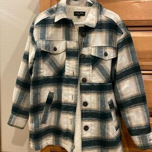 Women green and crème colored fleece lined flannel jacket